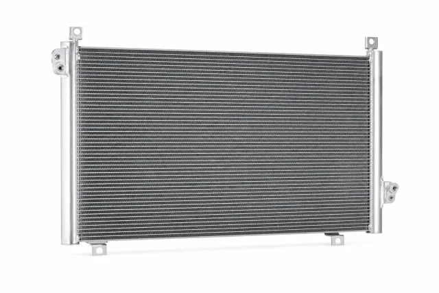 Unbranded automotive air-conditioning condenser on a white background